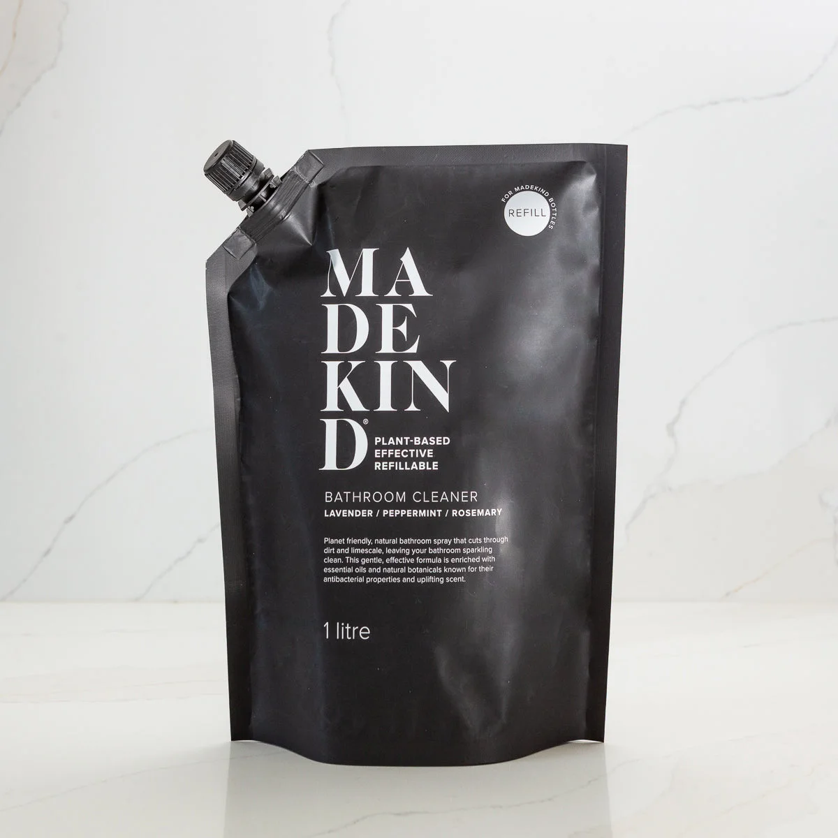 Natural, eco-friendly bathroom cleaner in 1L pouch. Removes limescale