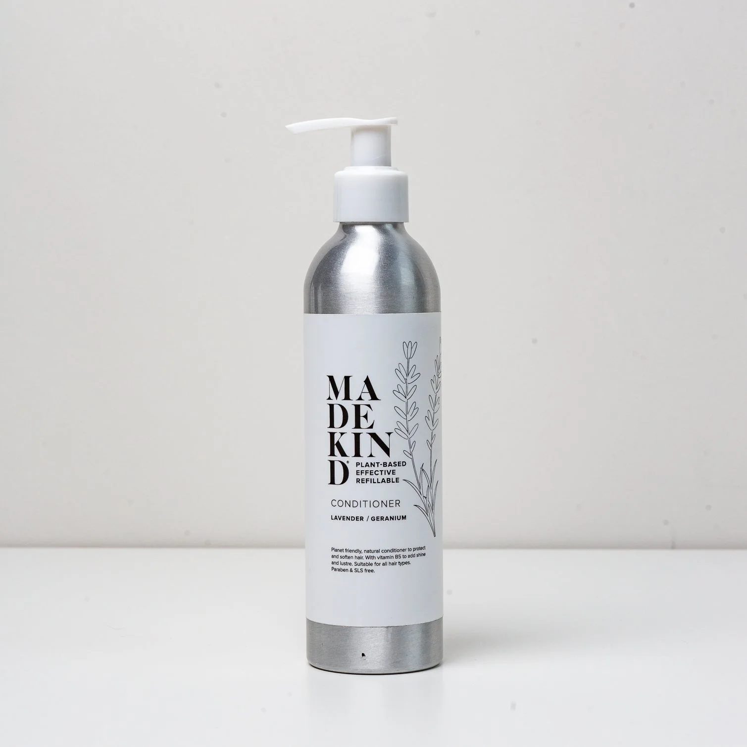 photo of a 250ml MadeKind natural hair conditioner, scented with Lavender & geranium, in an aluminium bottle
